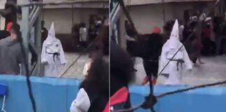 VIDEO: Docente acudió con vestimenta de Ku Klux Klan a escuela. Maestro lleva disfraz del Ku Klux Klan