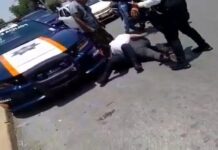 VIDEO: Automovilista y policía terminaron “trenzadas” en el piso. Automovilistas y policía terminan en el piso