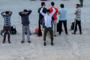 Migrantes en la frontera entre Tijuana y San Diego