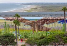 VIDEO: Un mensaje de paz fue plasmado en el muro de Playas de Tijuana.