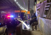 Localizan cuerpo sin vida con huellas de violencia y cartulina amenazante en Zona Centro de Tijuana.