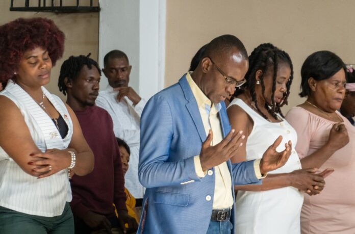 Haitianos misa día del padre