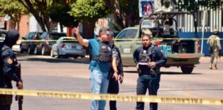 Lesionan a balazos a agente de la AEI tras enfrentamiento en Tecate.