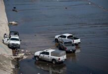 Localizan a mujer sin vida y con quemaduras en la canalización del Río Tijuana.