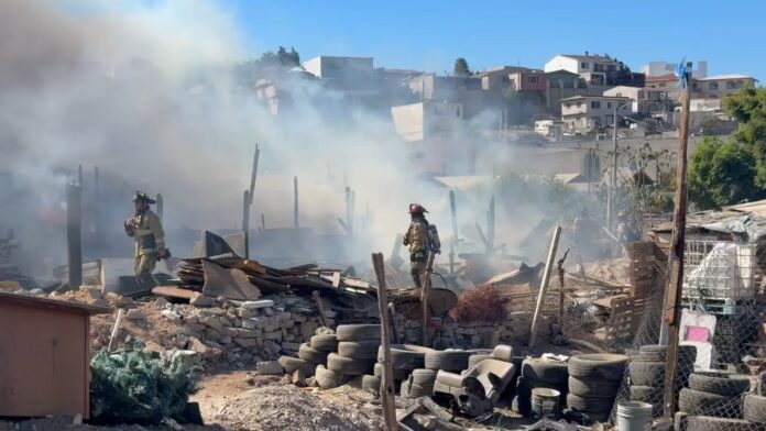 Incendio casa y taller mecánico .