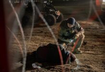Migrante resulta con fracturas tras caer del muro fronterizo en Tijuana.