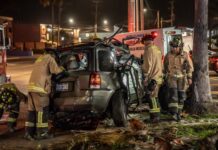 Muere policía municipal prensado en accidente en Playas de Tijuana, mujer resulta grave.